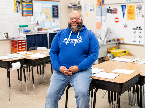 Mr. White in his classroom